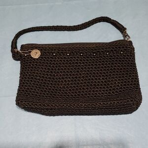 The Sak Black Woven Clutch Wristlet with Sparkle